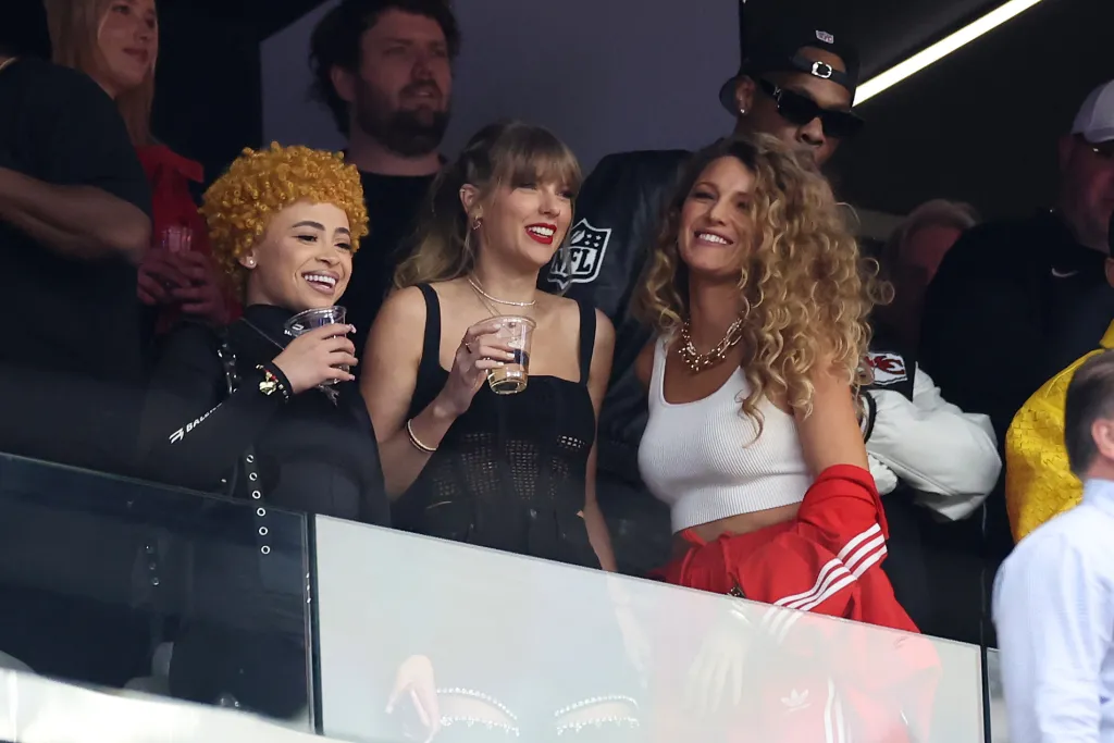 Rapper Ice Spice, singer Taylor Swift, and actress Blake Lively reacting at Super Bowl LVIII.