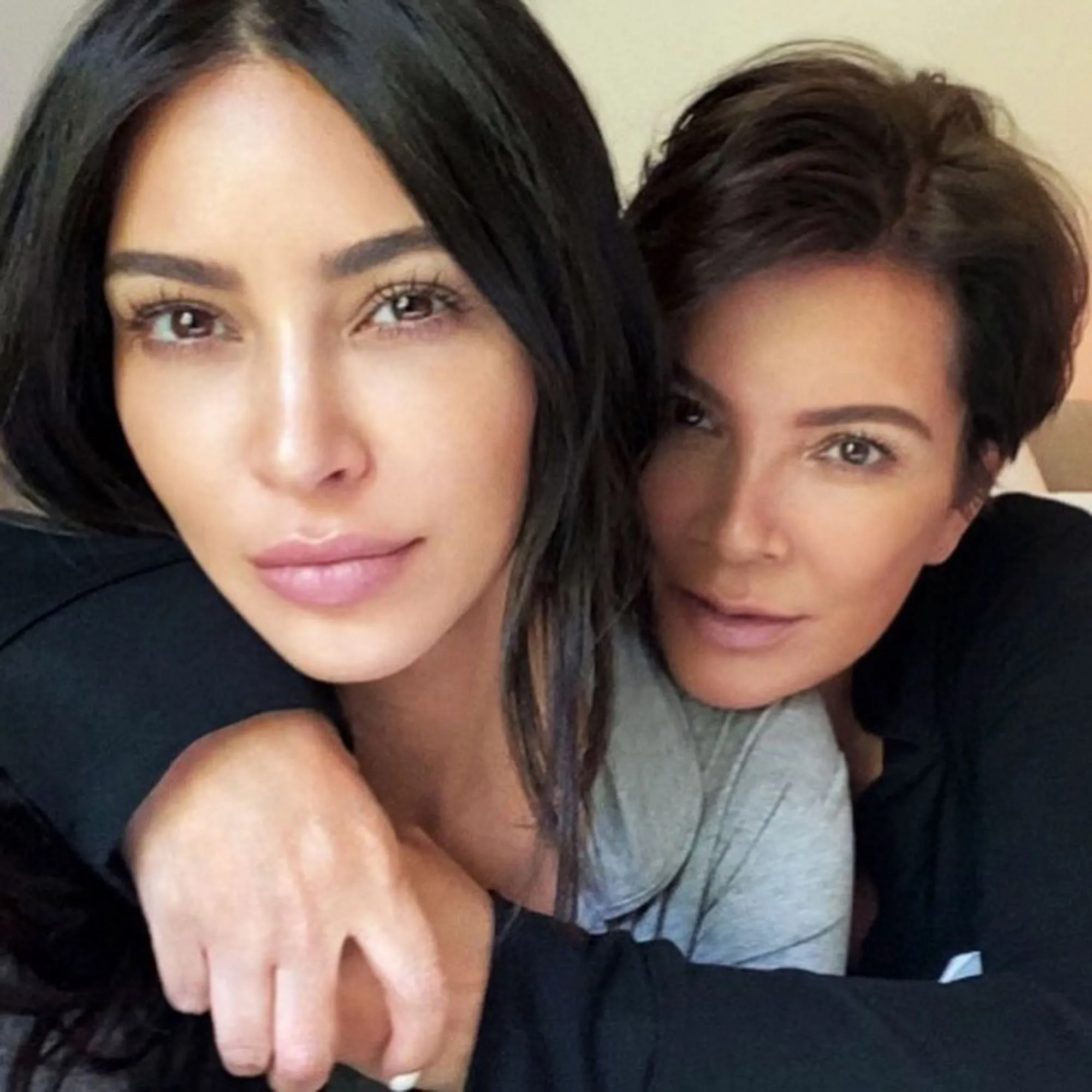 Kim Kardashian and Kris Jenner taking a selfie together.