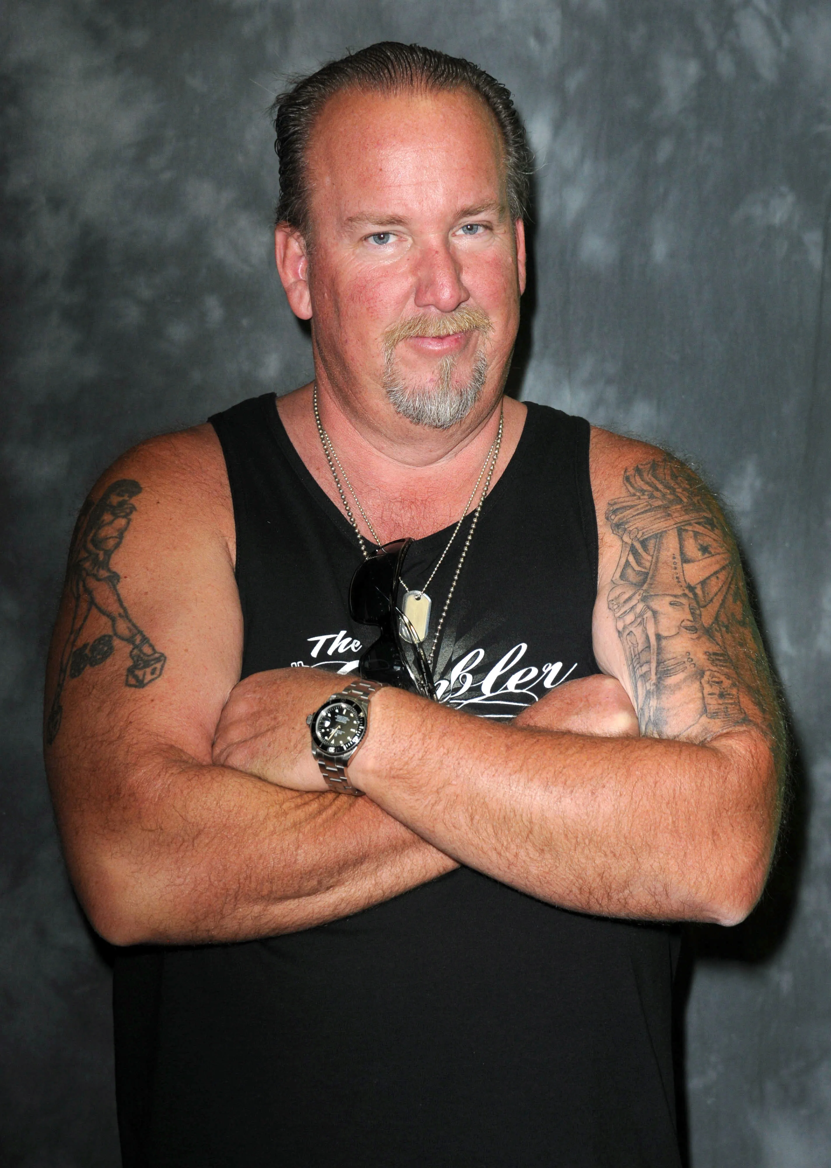 Reality star Darrell Sheets posing with his arms crossed.