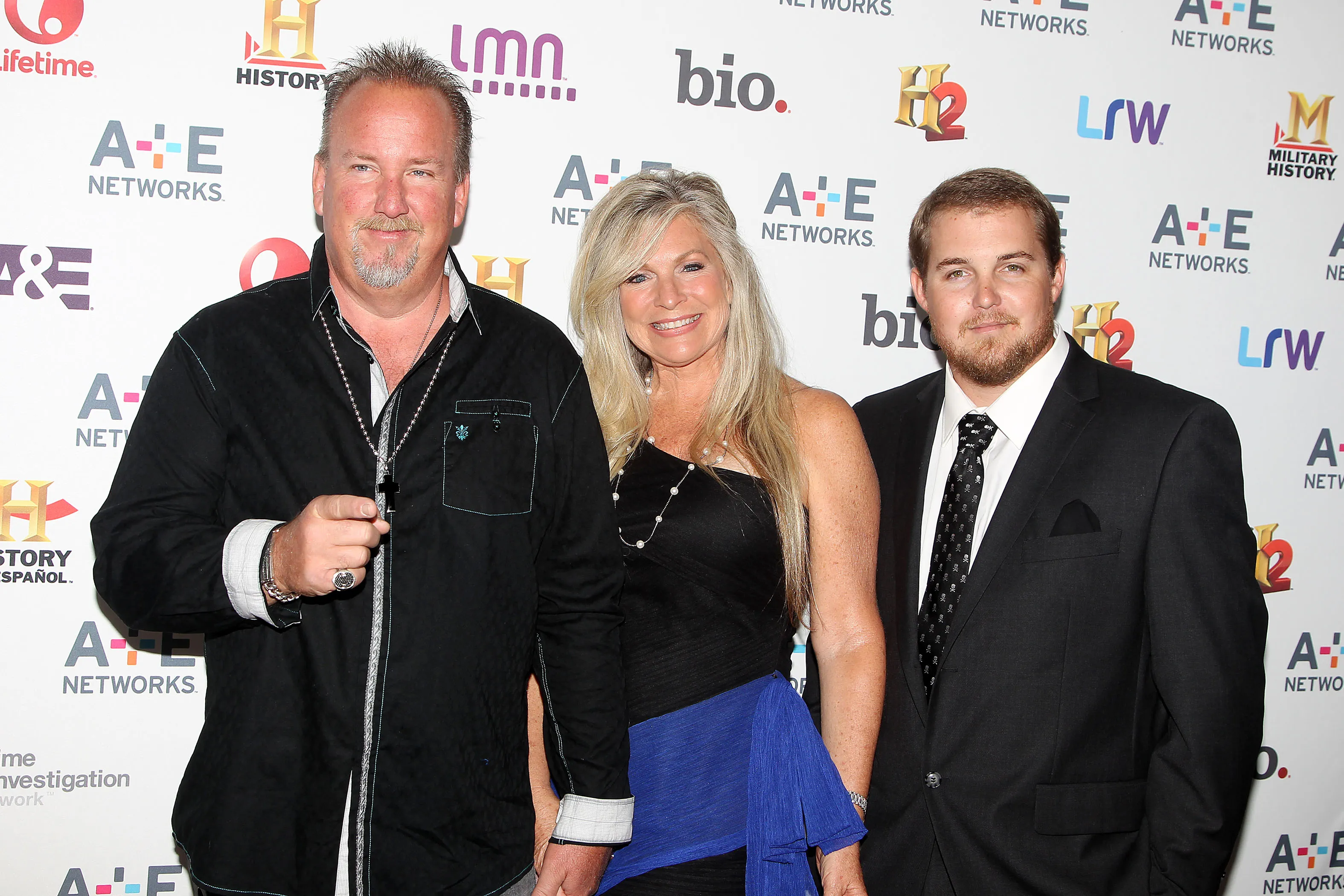 Darrell Sheets, Kimber Wuerfel, and Brandon Sheets pose together.