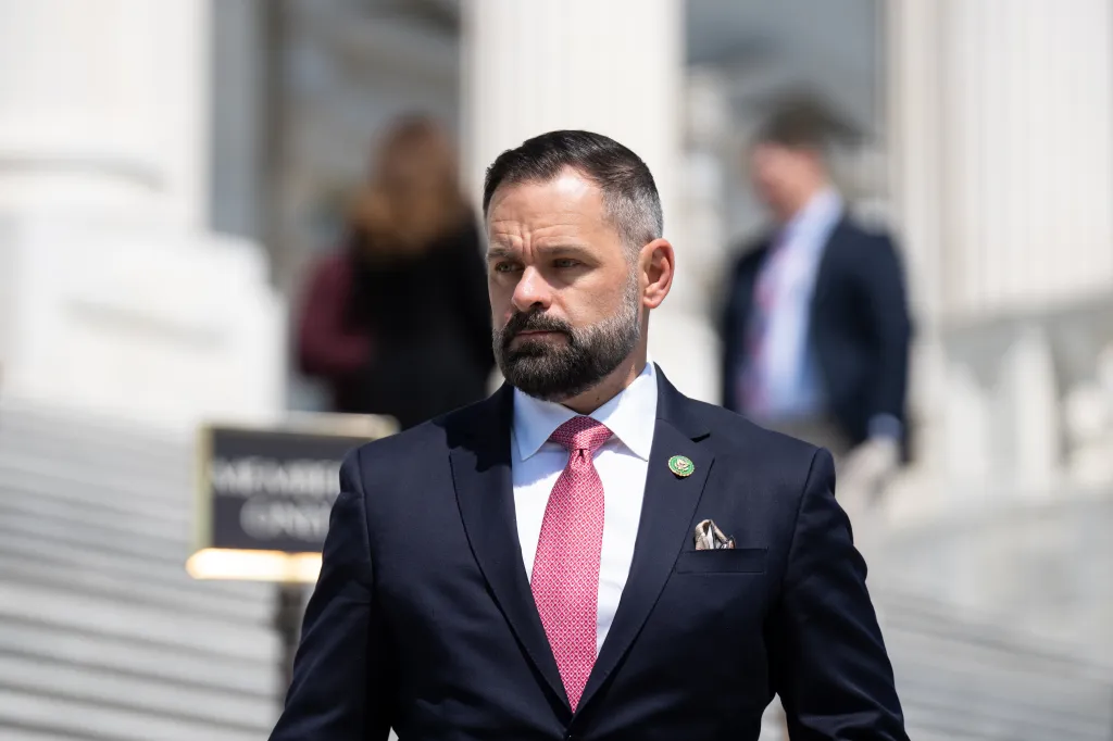 Rep. Cory Mills walks down the House steps of the Capitol.