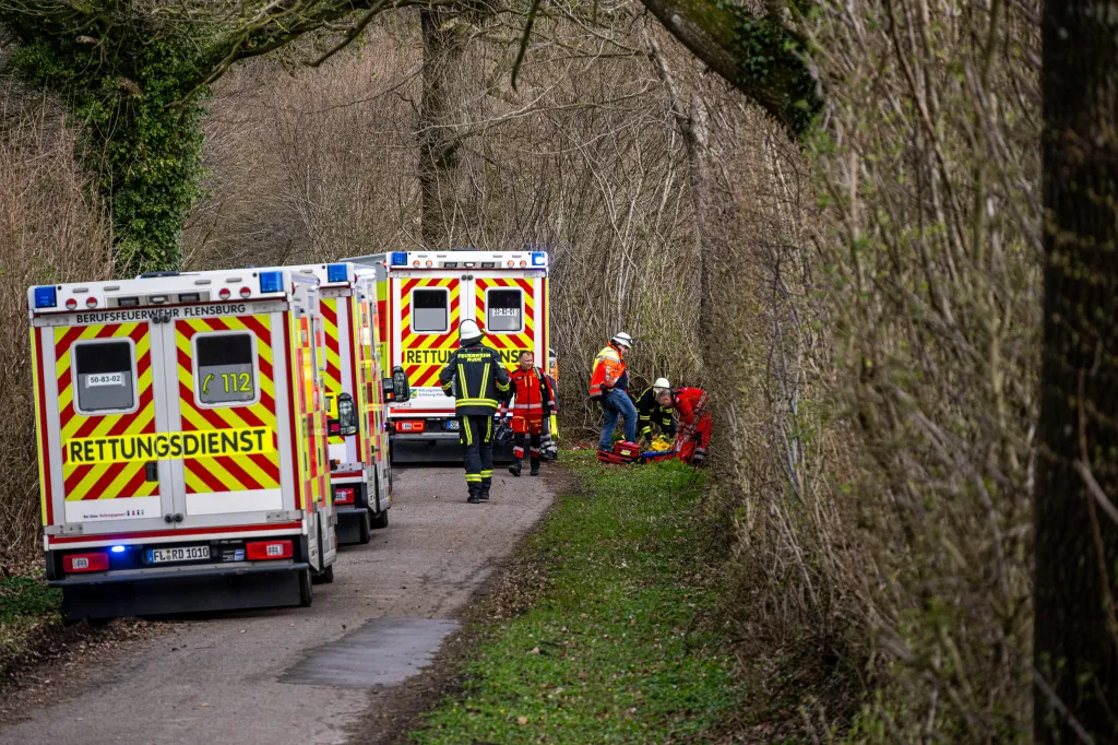 Rescue workers are on the scene after an accident in a wooded area south-east of Flensburg, Germany on Sunday, April 5, 2026. 