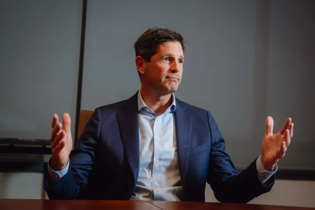 Rick Wurster, Charles Schwab Corp. Chief Executive Officer, gesturing during an interview.