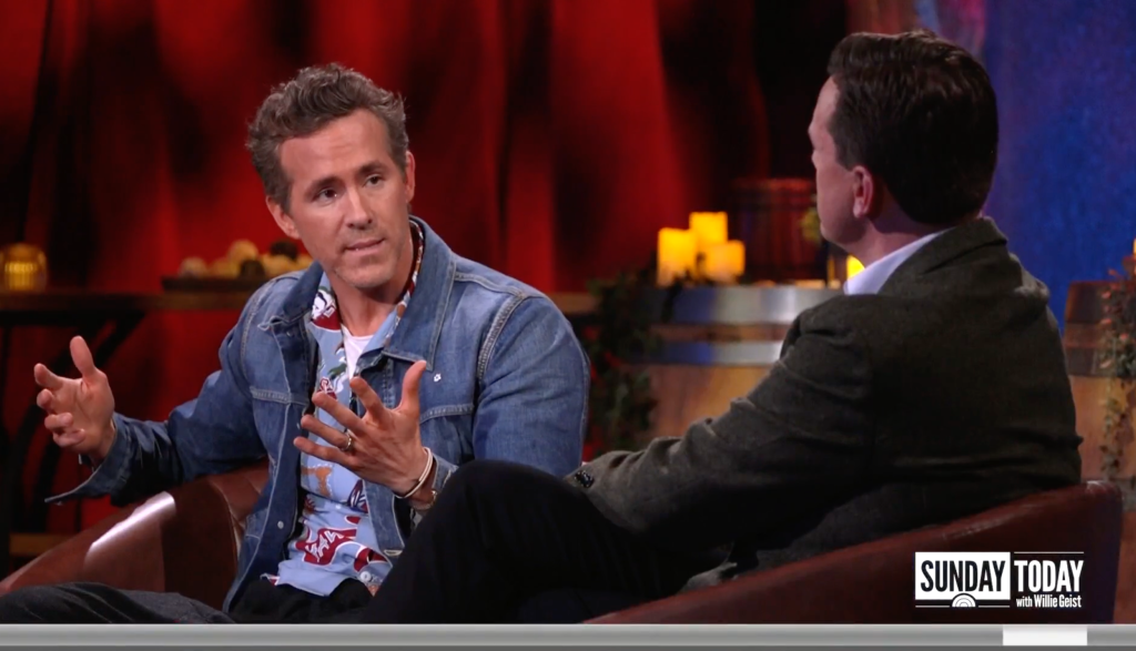 Ryan Reynolds gestures with his hands during an interview with Willie Geist on 