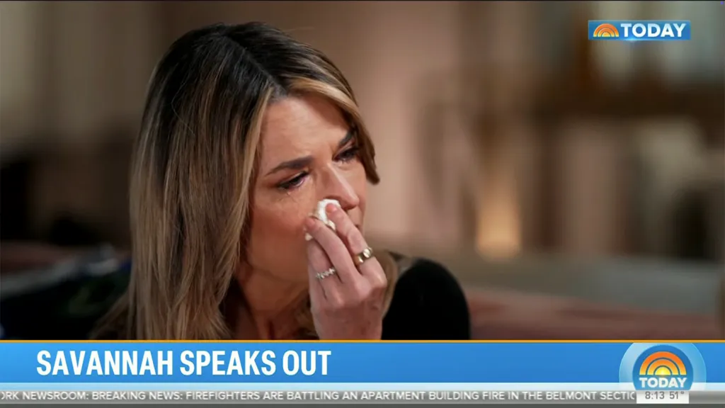 Savannah Guthrie on the Today show, wiping away tears.