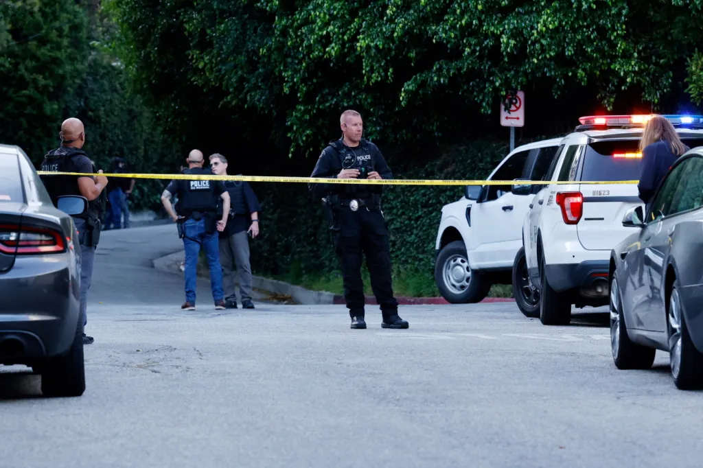 Police officers at the scene of the arrest of D4vd in Los Angeles.
