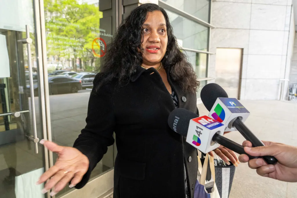 Sealema Allen, mother of Najeir Allen, speaks to reporters.