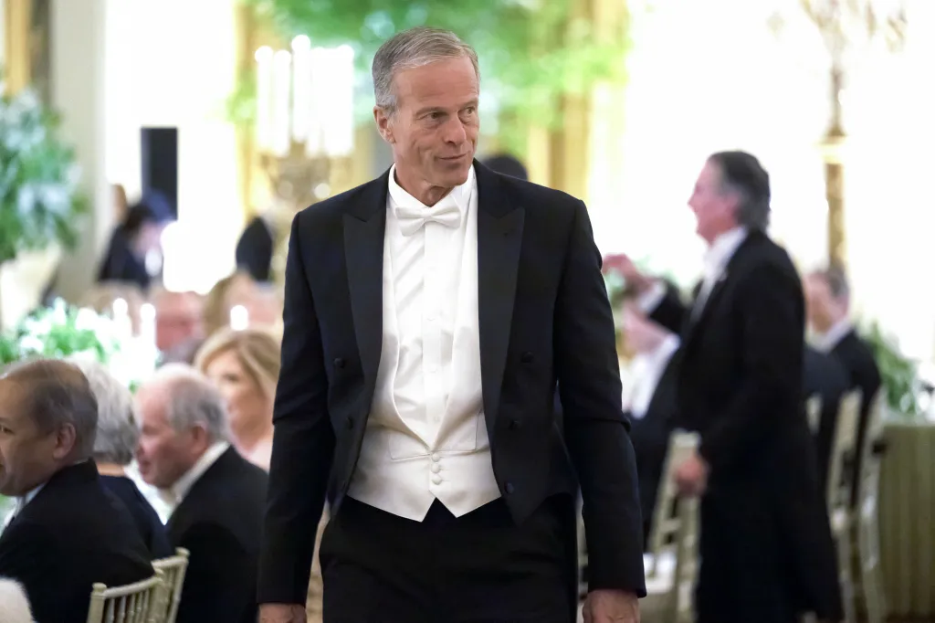 Senator John Thune in a tuxedo at a state dinner.