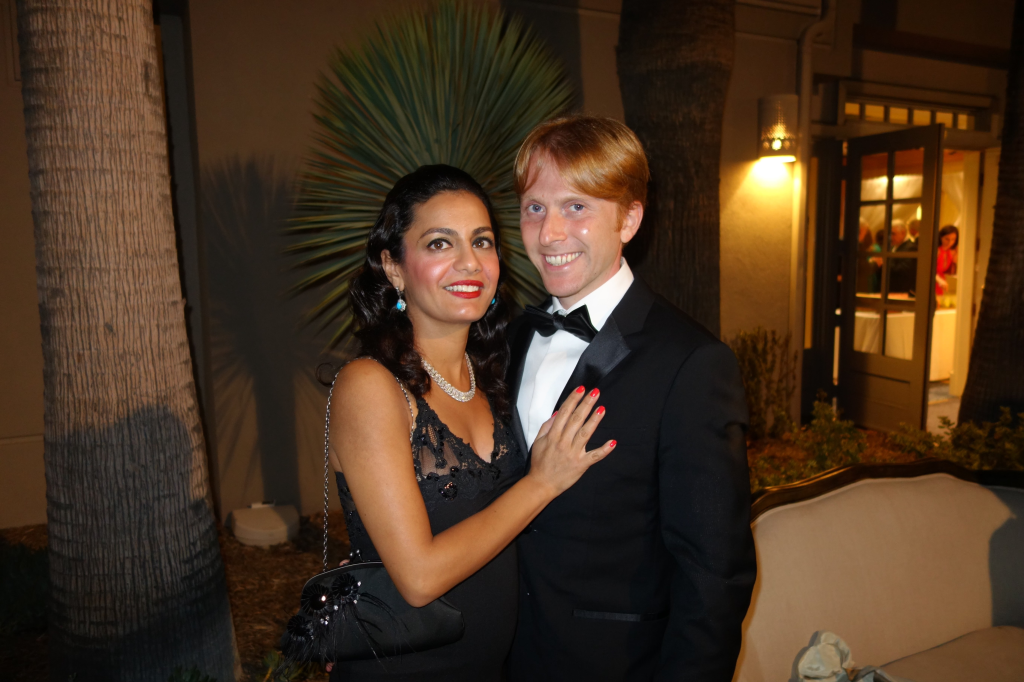 Seterah Bral and Dr. Ryan Aronin smiling at the camera, Bral with her hand on Aronin's chest.