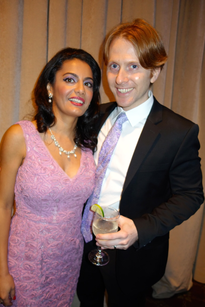 Seterah Bral and Dr. Ryan Aronin smiling at an event.