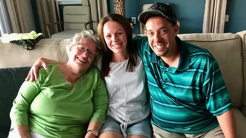 Robert Jamieson with two women, likely family members.