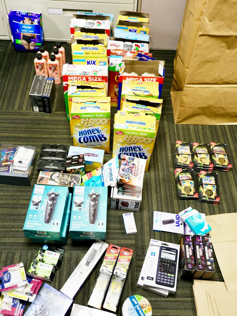 Stolen merchandise, including Pokémon cards, hidden in cereal boxes.