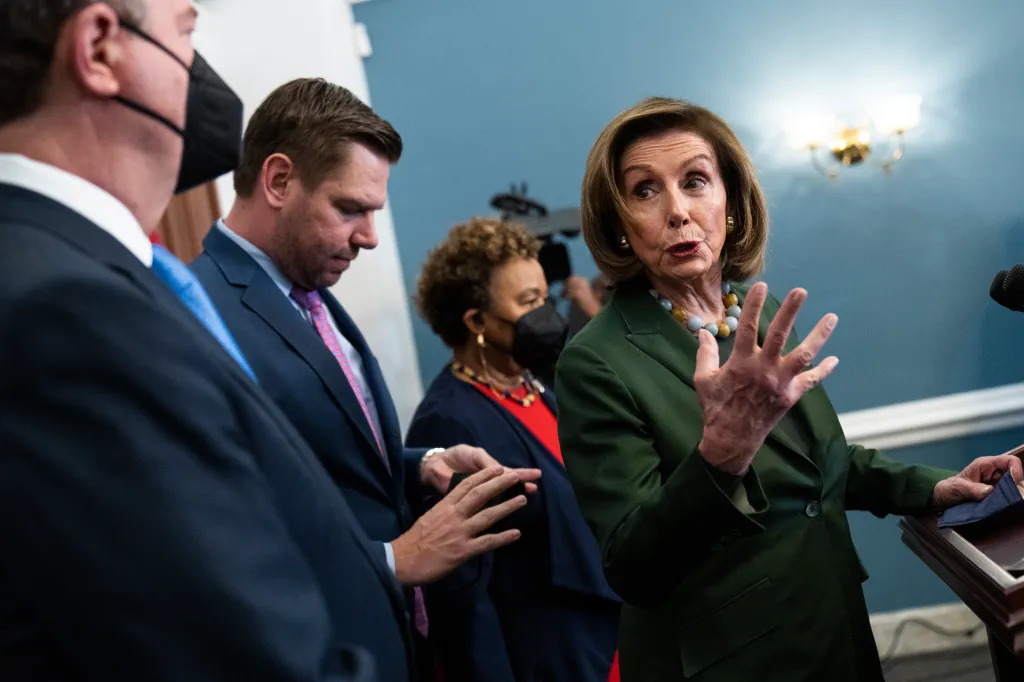 Speaker of the House Nancy Pelosi speaking at a news conference with Representatives Adam Schiff, Eric Swalwell, and Barbara Lee.