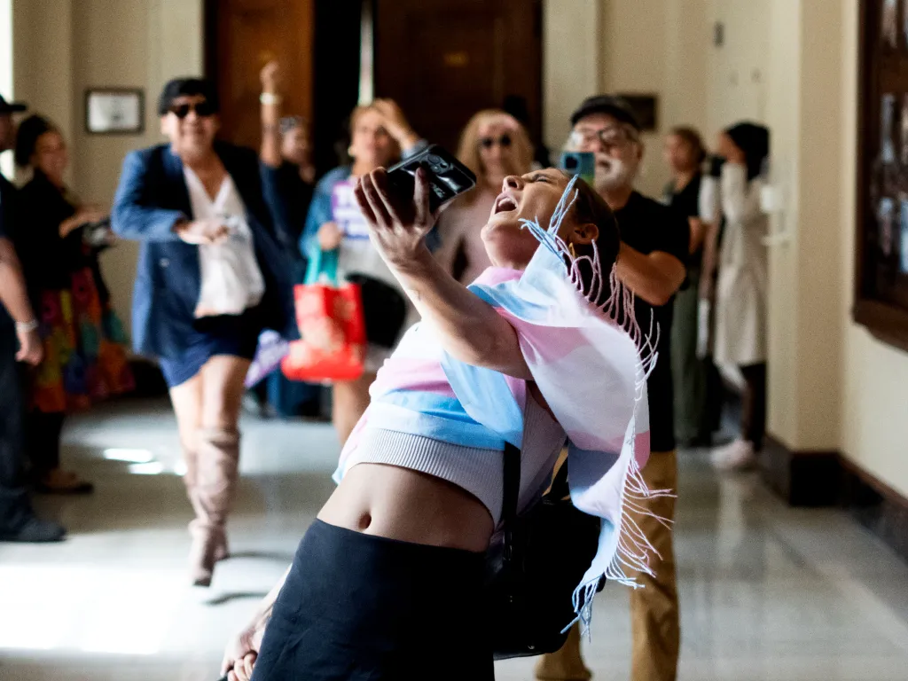 Shannon Axe, a trans woman, shouts during a Special meeting of the Budget and Finance Committee at City Hall in Downtown Los Angeles.