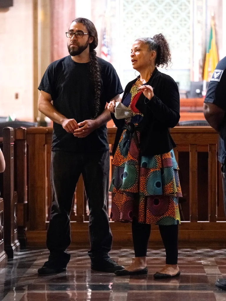 Dr. Molina Abdullah and Dr. David Turner speak to the budget and finance committee at City Hall.