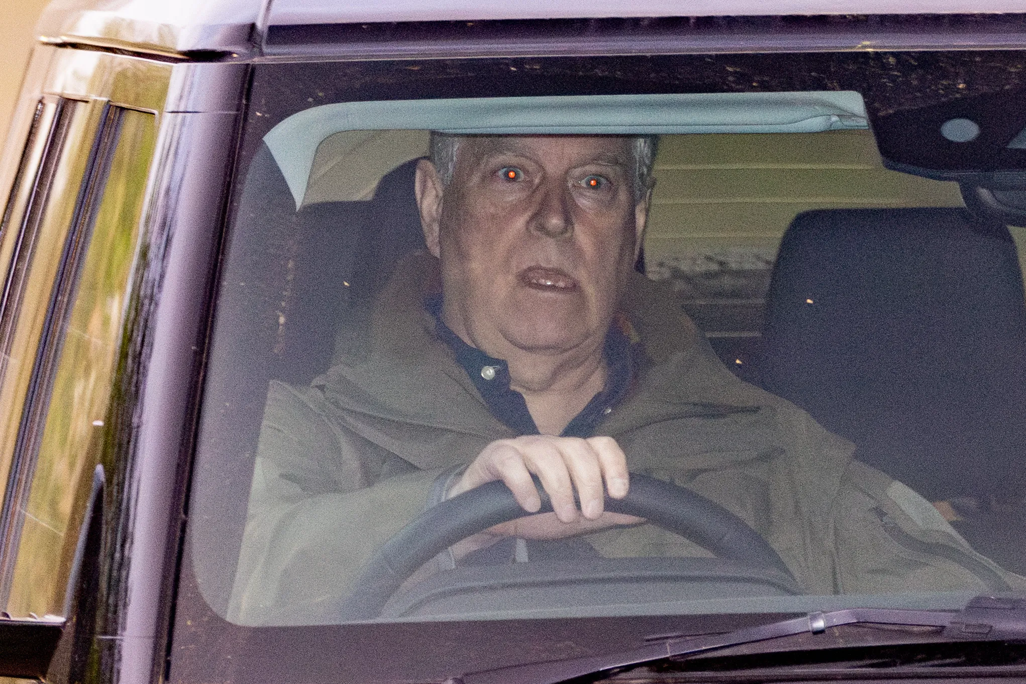 Prince Andrew, Duke of York, driving a car.