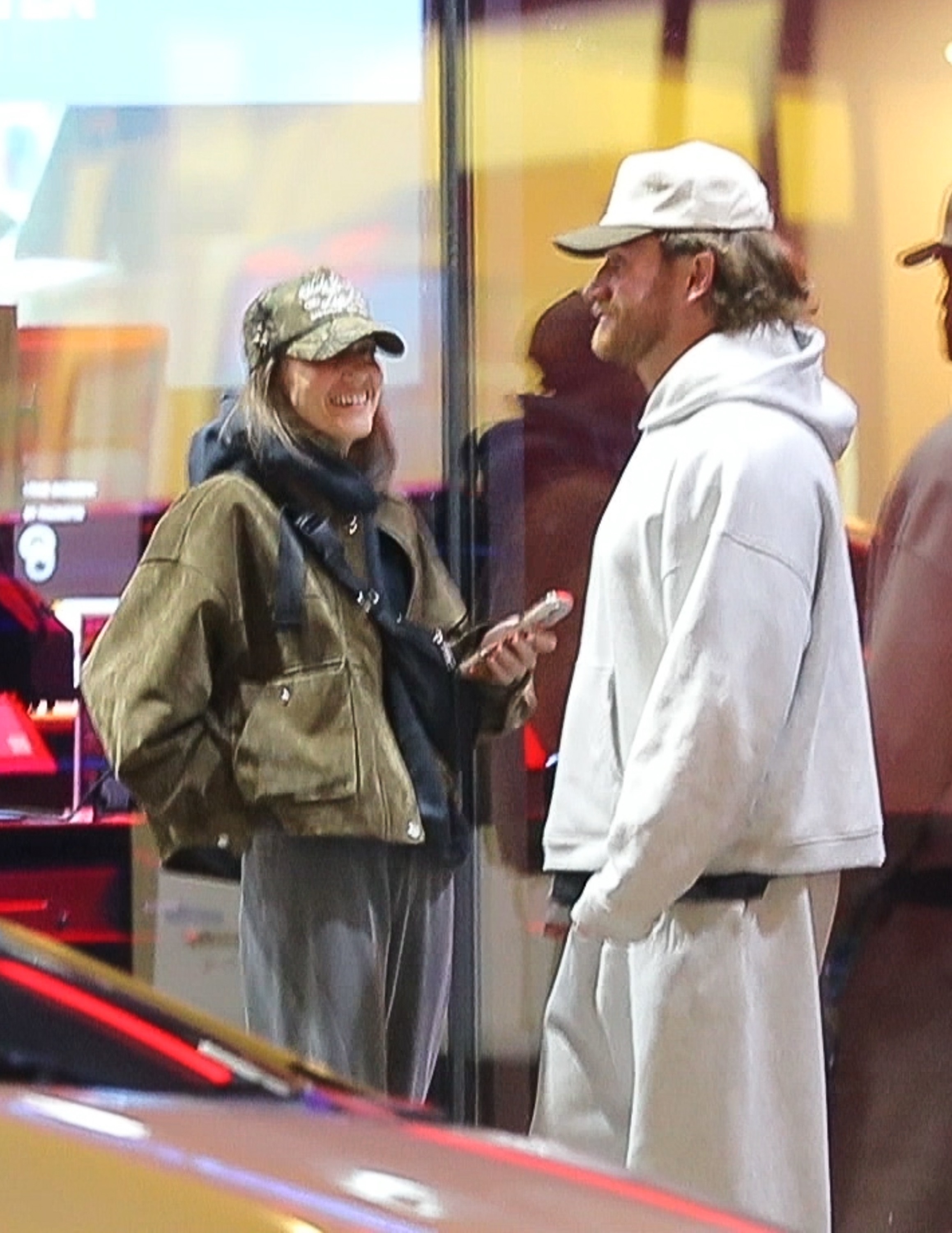 West Wilson and Amanda Batula smile at each other during a movie date in New York.