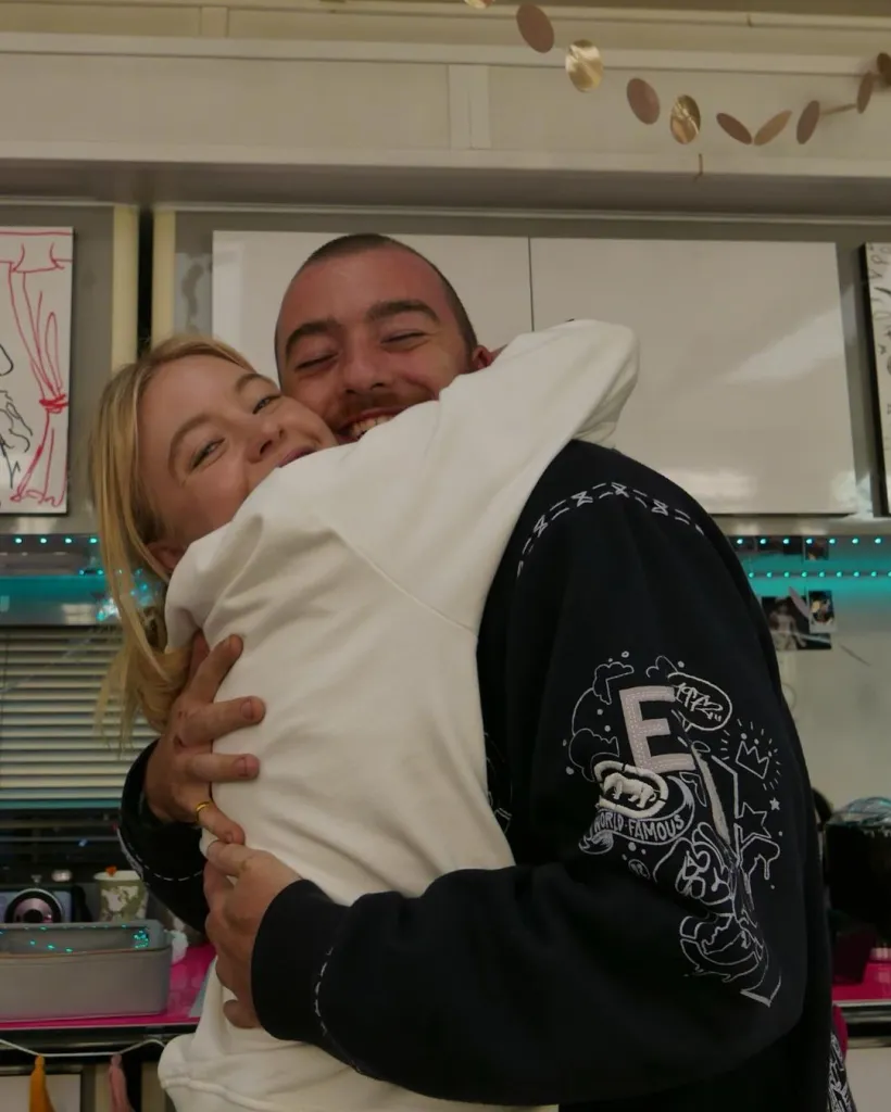 Sydney Sweeney and Angus Cloud hugging.