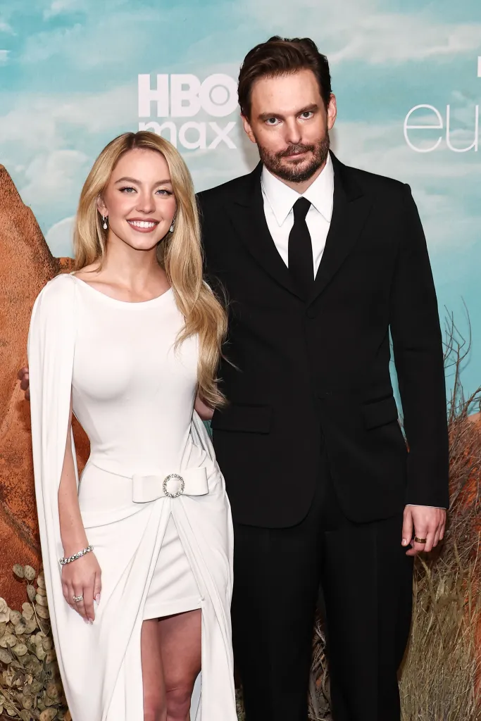 Sydney Sweeney and Sam Levinson smiling at the 