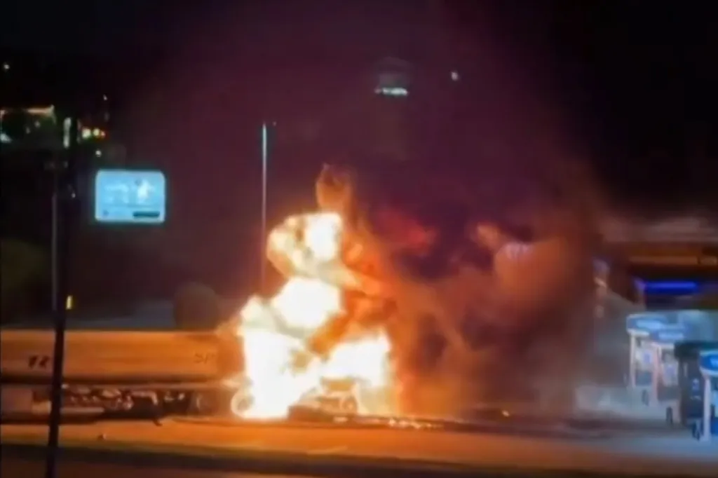 A tanker truck in Texas hauling gasoline erupted into a fiery blaze on Sunday morning after colliding with another vehicle and knocking over power lines, leaving the truck driver in critical condition.