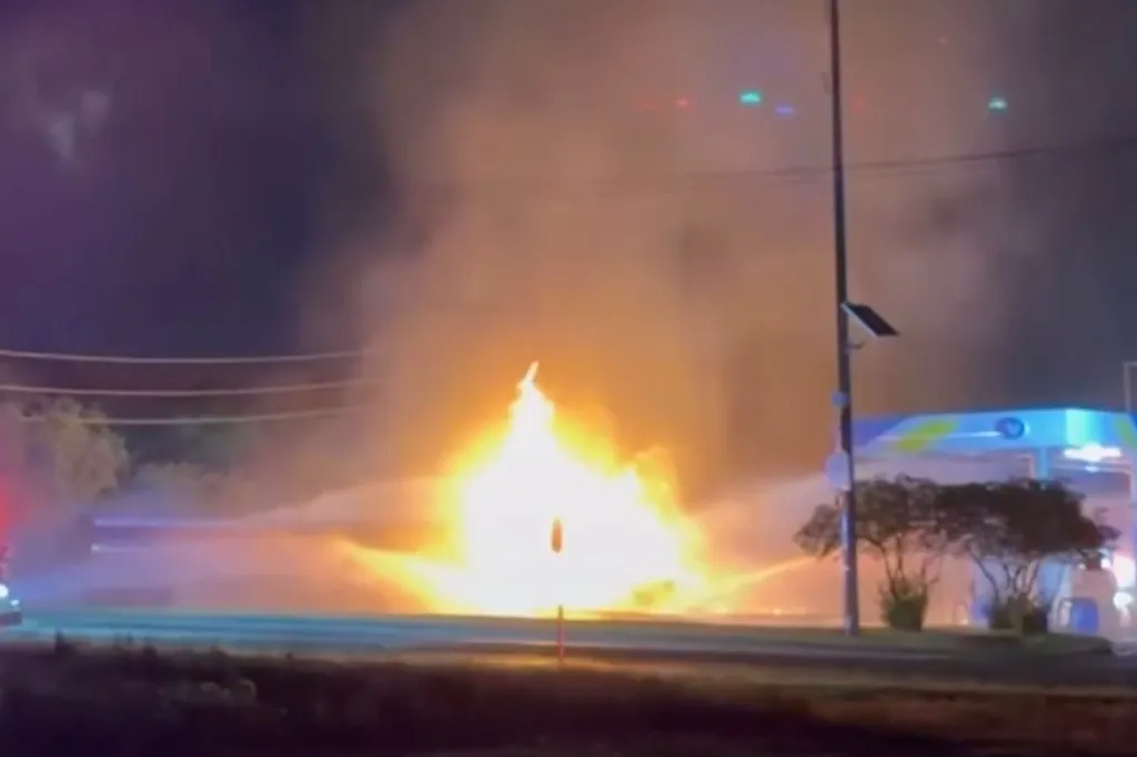 The 18-wheeler was carrying 9,000 gallons of gasoline that began leaking after the truck spun off the road near a gas station. 