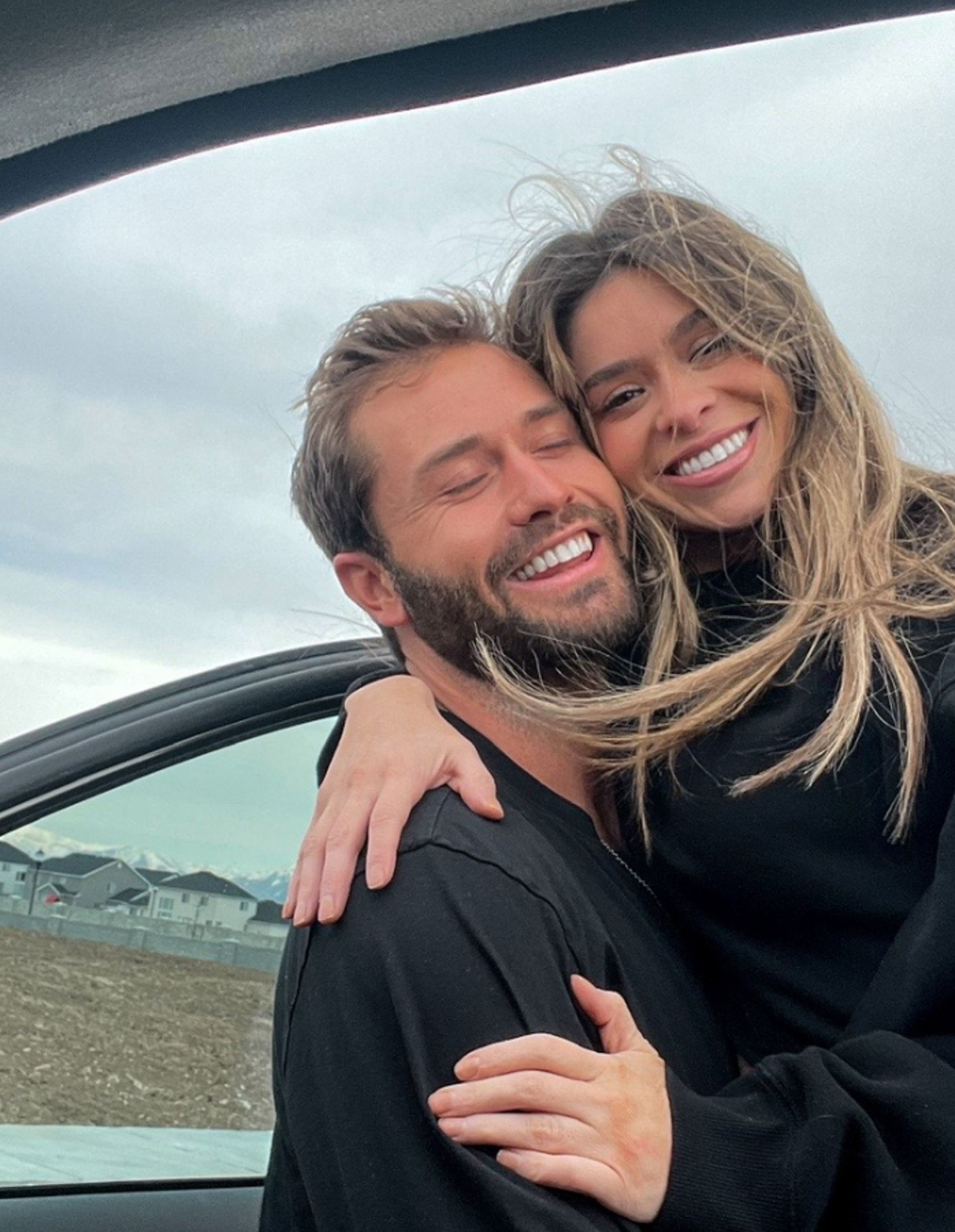 Taylor Frankie Paul with her arms around ex-boyfriend Dakota Mortensen, both smiling.