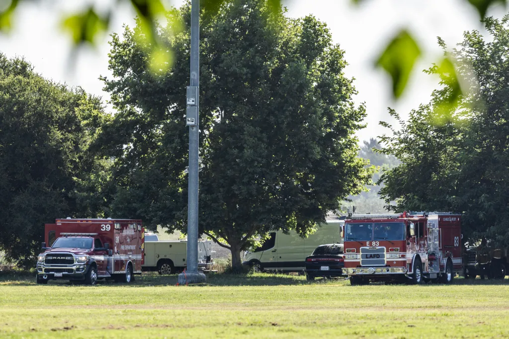 A Los Angeles Fire Department ambulance and fire truck at the scene of a fire.
