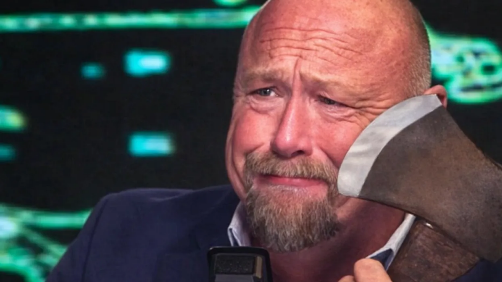 Alex Jones cradles battle axe while weeping on air over Trump’s ‘demonic spell’