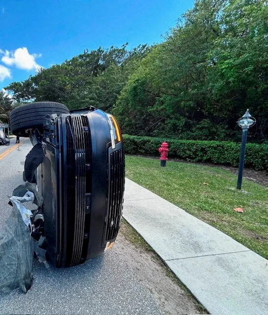 Tiger Woods' Land Rover rolled over on a two-lane road.