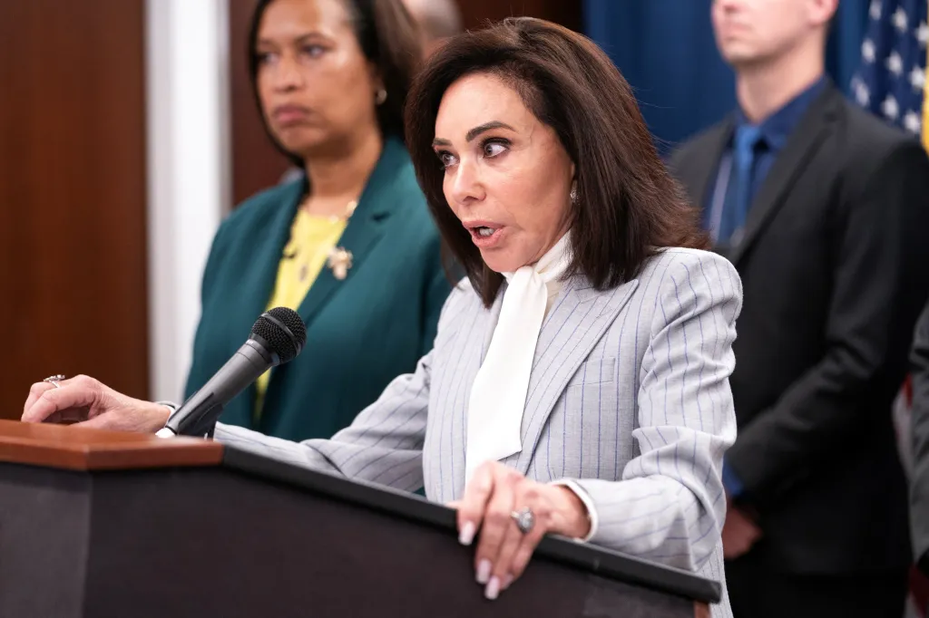 Jeanine Pirro at a press conference announcing charges in an international car theft ring.