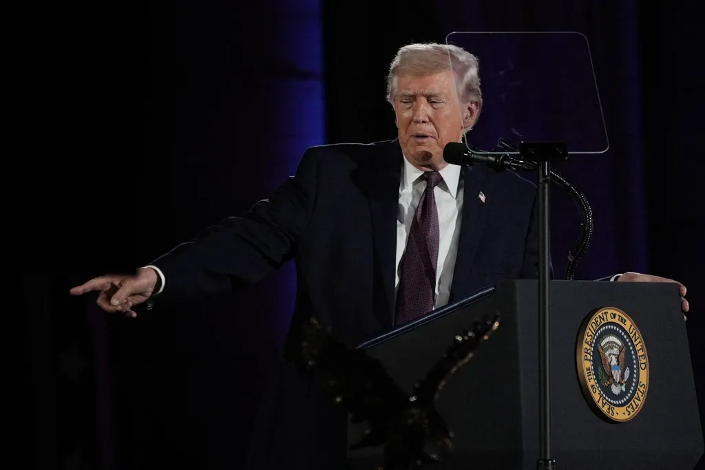U.S. President Donald Trump giving remarks and pointing at the National Republican Congressional Committee (NRCC) annual fundraising dinner.