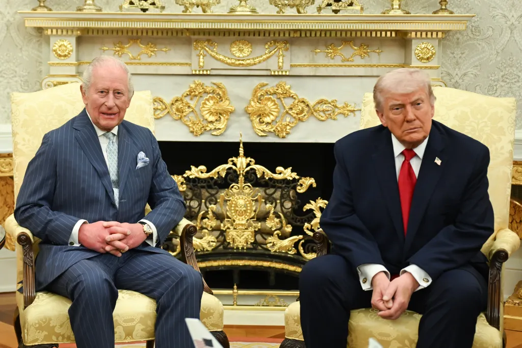 King Charles III and Donald Trump seated in ornate chairs.