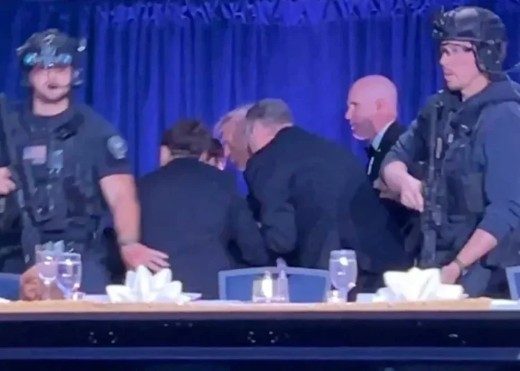 Photos capture guns drawn and guests diving under tables as pandemonium grips WHCD