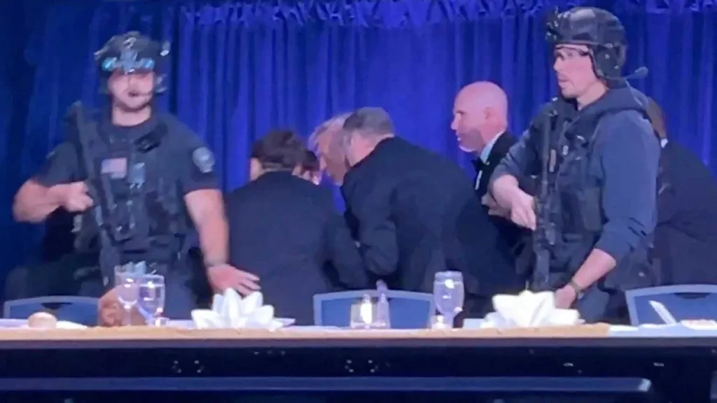 Photos capture guns drawn and guests diving under tables as pandemonium grips WHCD