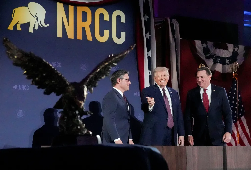 Donald Trump, House Speaker Mike Johnson, and Rep. Richard Hudson at the NRCC annual fundraising dinner.