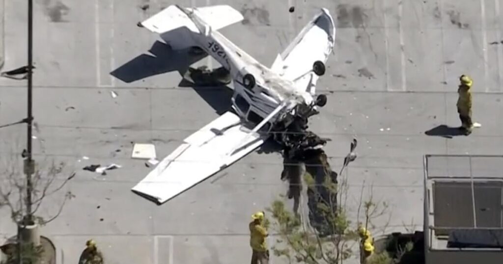 Plane crashes upside down in SoCal auto store parking lot, pilot hospitalized