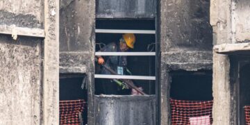 Grieving, traumatized survivors return to their homes 5 months after deadly Hong Kong fire