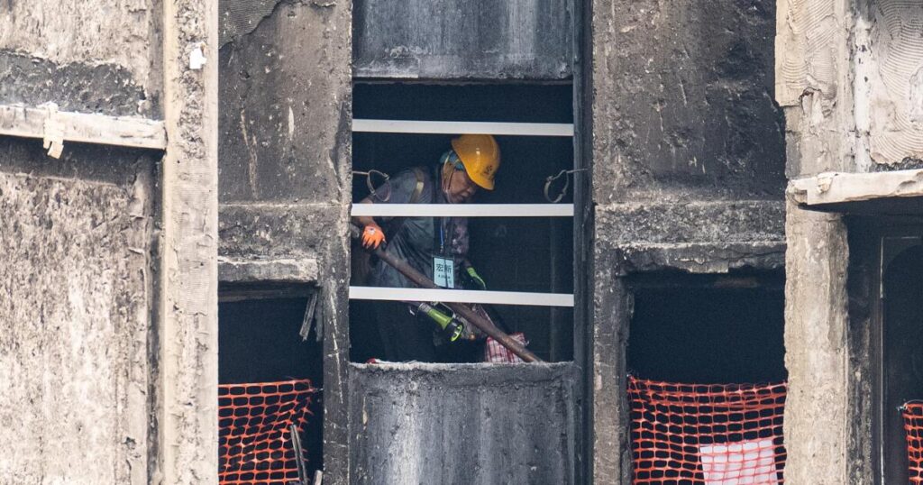 Grieving, traumatized survivors return to their homes 5 months after deadly Hong Kong fire