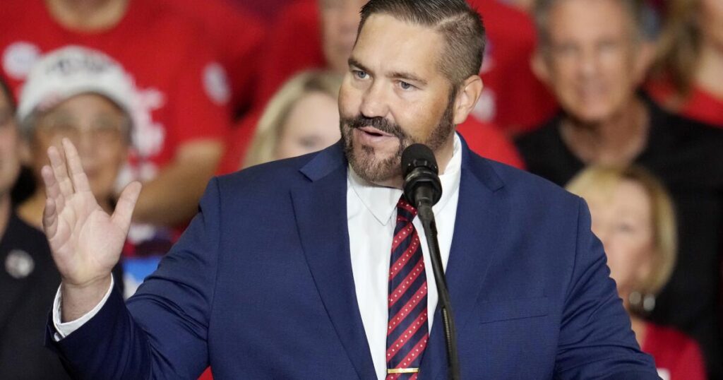 Judge sides with Arizona election official in ruling that has implications for midterm voting