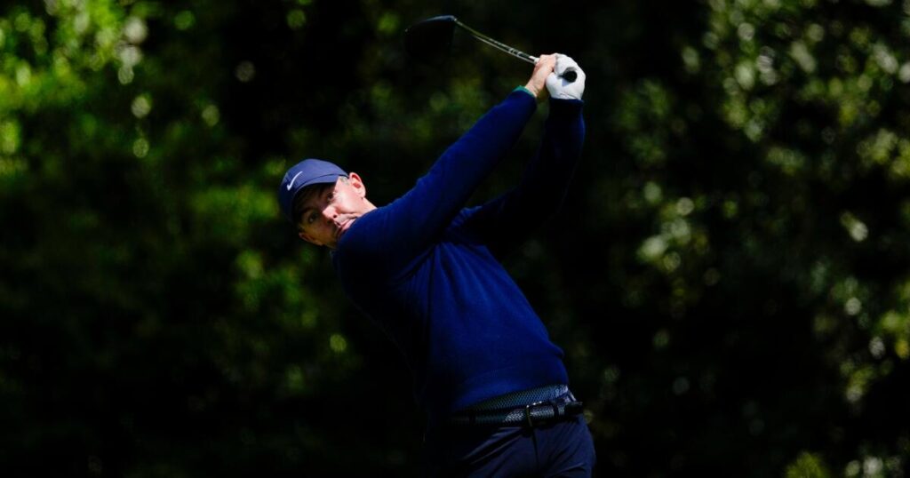 Defending champ Rory McIlroy excels in tough conditions to share Masters lead