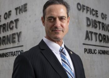 Former O.C. cop used database to track woman, contacted her thousands of times, prosecutors say