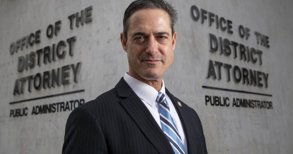 Former O.C. cop used database to track woman, contacted her thousands of times, prosecutors say