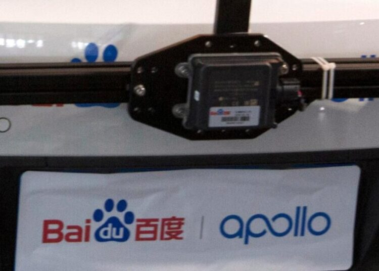 Passengers stranded in moving traffic after robotaxi outage in China’s Wuhan