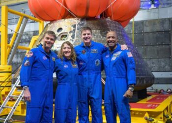 Artemis II’s moon-traveling astronauts return home to cheers after a record-breaking trip