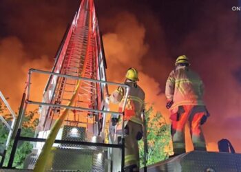 Huge paper warehouse burns in Ontario, collapsing roof, forcing firefighters to retreat