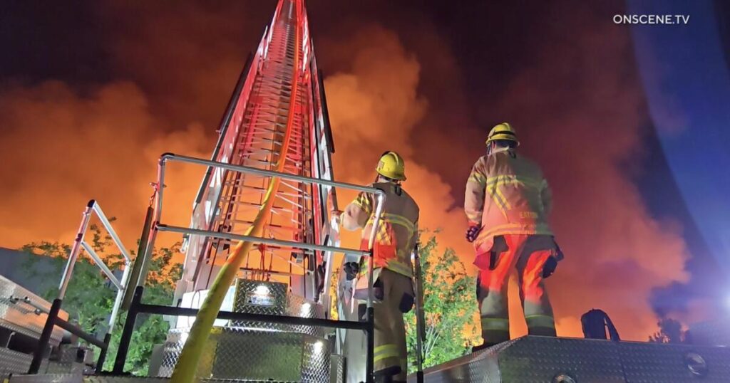 Huge paper warehouse burns in Ontario, collapsing roof, forcing firefighters to retreat