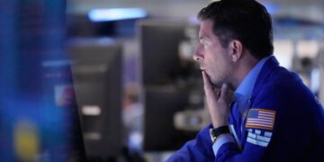 Wall Street hits a record amid optimism about the Iran war