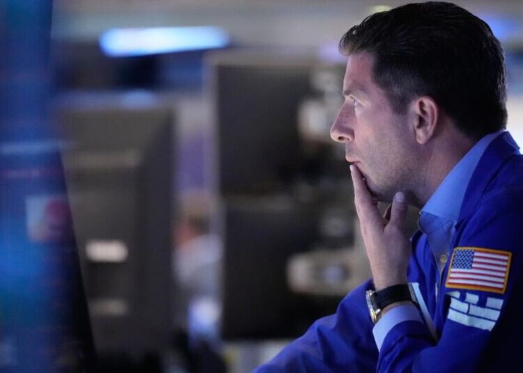 Wall Street hits a record amid optimism about the Iran war