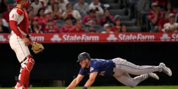 Angels muster only one hit in extra-innings loss to Seattle in home opener