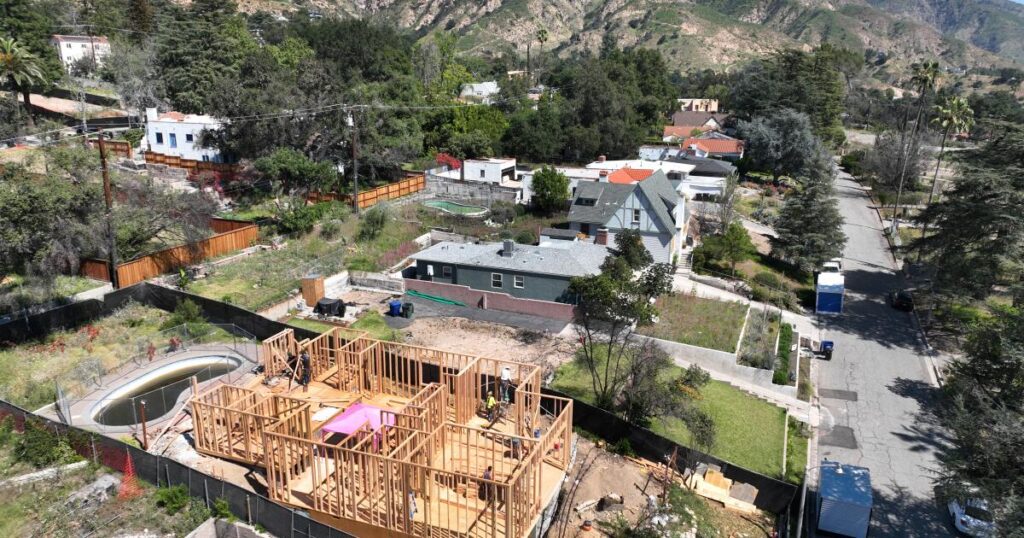 Rebuilding permits in Altadena have picked up, but construction lags and financial woes loom